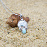 Sea Turtle Pendant Necklace with Blue Topaz, Mother of Pearl Mosaic and Larimar Stone