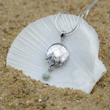 Sea Turtles Pendant Necklace with Blue Topaz, Mother of Pearl Mosaic and Larimar Stone