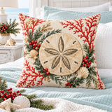 Sand Dollar coastal Christmas cushion cover on a coastal bed with pale aqua bedding