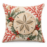 Sand Dollar coastal Christmas cushion cover with festive red and green details on cream, shown on a white background