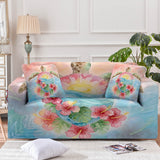 Sofa with floral sea turtle design slipcover and matching pillows in a living room setting.