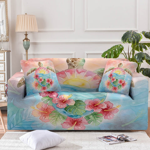 Sofa with floral sea turtle design slipcover and matching pillows in a living room setting.