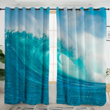 Blue ocean wave curtains in a room with a window.