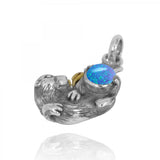 Oxidized Silver Otter With Gold Holding Round Blue Opal Pendants